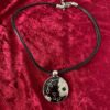 Black and Silver Pendant on Thong