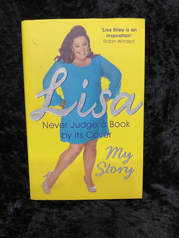 Never Judge a Book By its Cover: The Autobiography by Lisa Riley